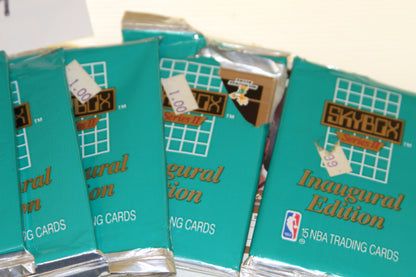 Detailed view of multiple SkyBox Series II Inaugural Edition basketball card packs