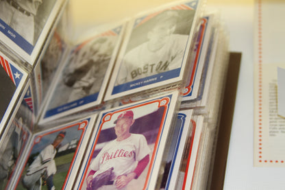 Phillies player card and other vintage baseball cards in album