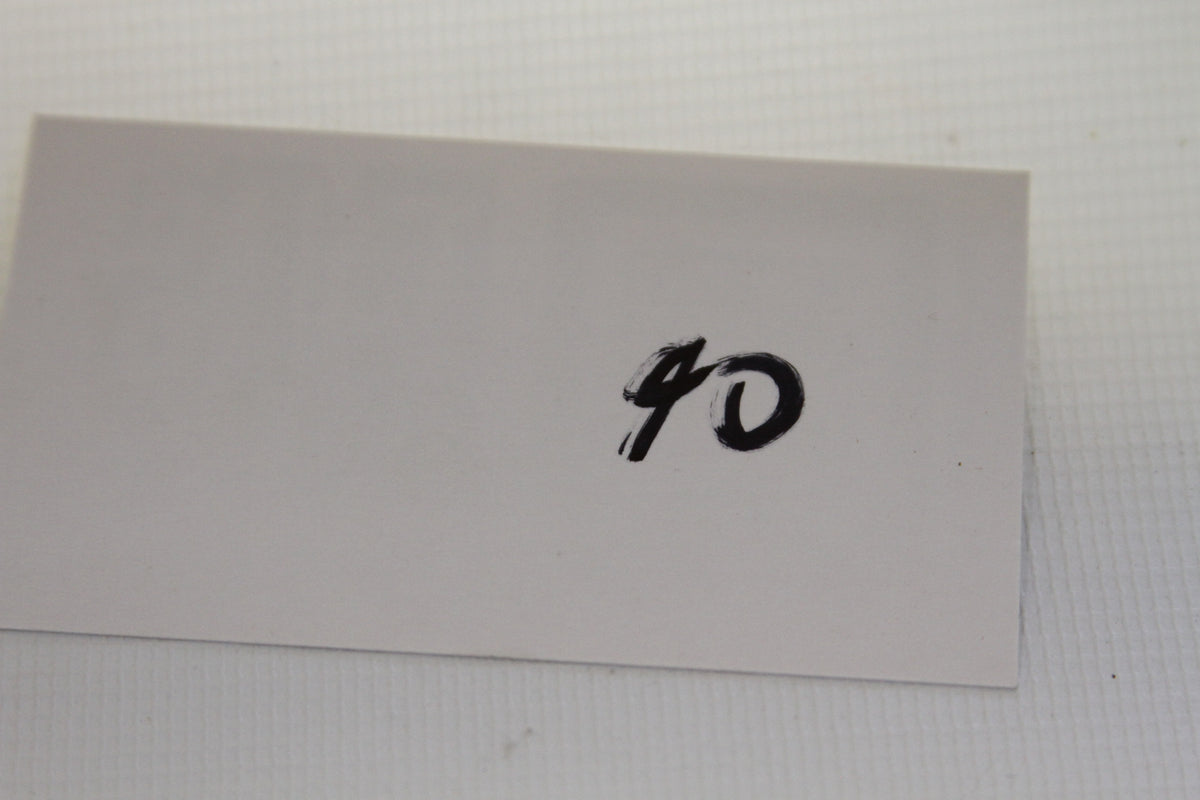 Numbered card labeled 40 included with the 1988 coin set