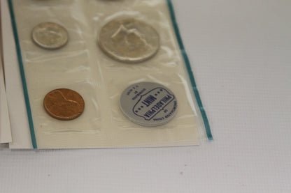 Detail of lower section of Philadelphia Mint set with coins and identifying token