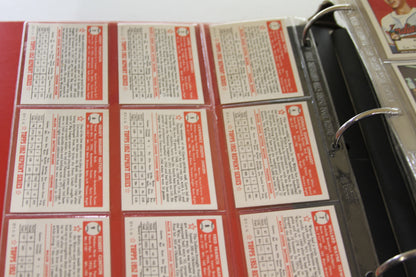 Rows of Topps 1952 Reprint Series card backs in plastic binder pages