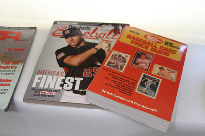 Beckett Baseball magazine and Baseball Card Price Guide stacked side by side