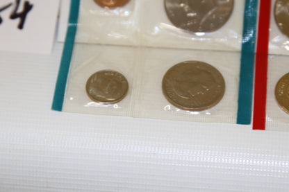 Bottom section of 1980 Mint coin set showing nickel and quarter