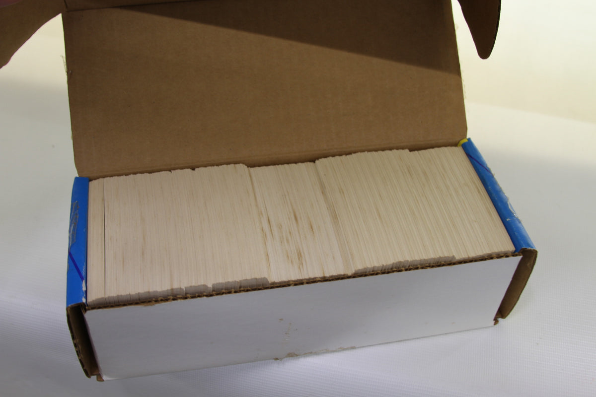Open box displaying rows of vintage hockey trading cards inside