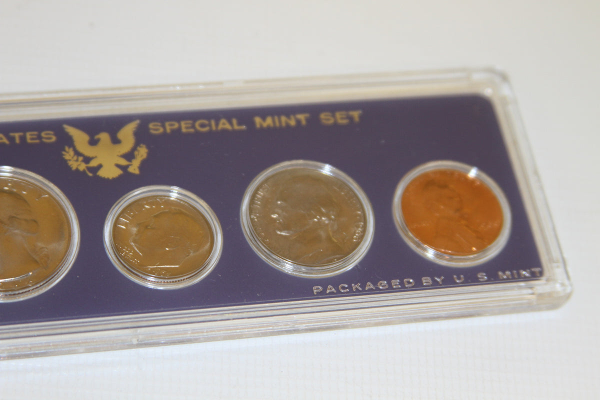 Detail showing Roosevelt dime, Jefferson nickel, and Lincoln cent from 1966 Mint Set