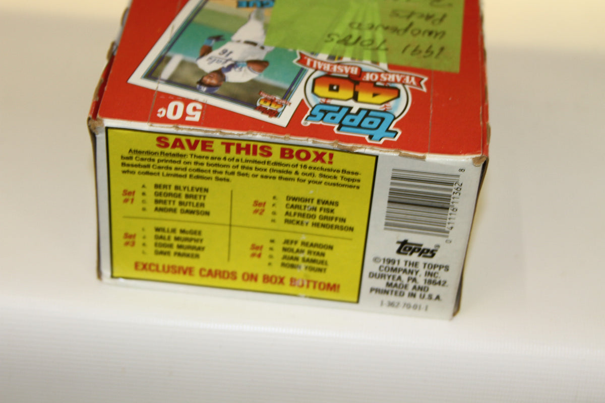 Corner of 1991 Topps Baseball box highlighting exclusive card info and barcode