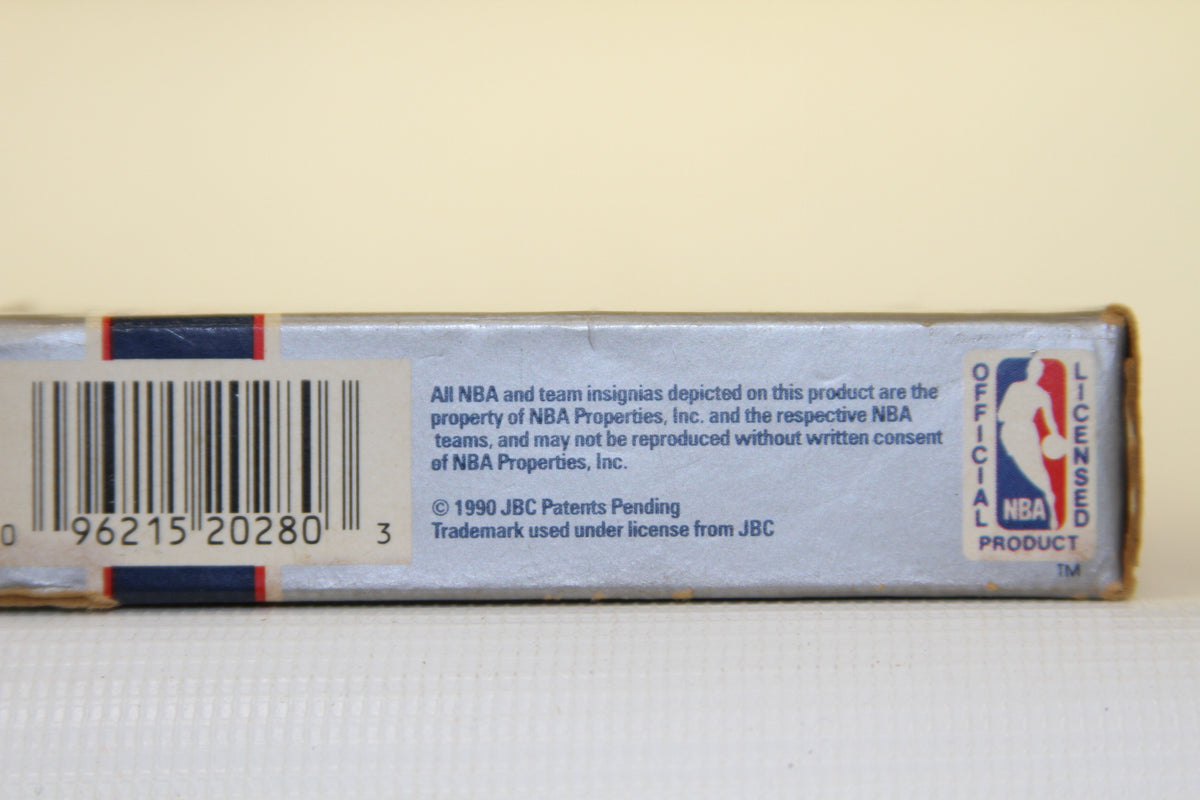 Official NBA licensed logo and details on the 1990 NBA Hoops box