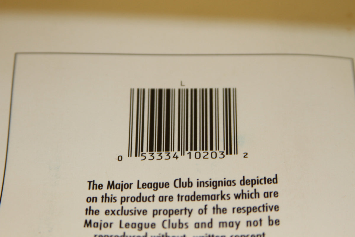 Closeup of barcode 053334102032 on back of box