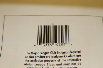 Closeup of barcode 053334102032 on back of box