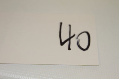 White card with handwritten number 40