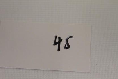 White card labeled 45 placed next to the product for inventory
