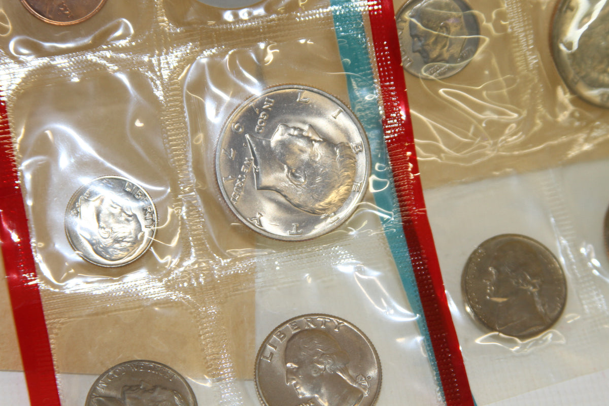 Detail of Washington quarter and Roosevelt dime in sealed packaging