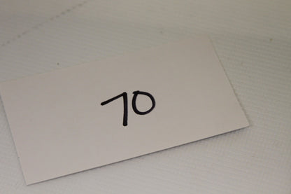 Number card showing lot 70 for inventory identification