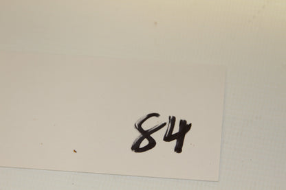 Card labeled 84 included with 1980 coin set