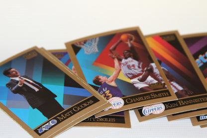 Fanned out NBA player cards including Matt Guokas and Charles Smith