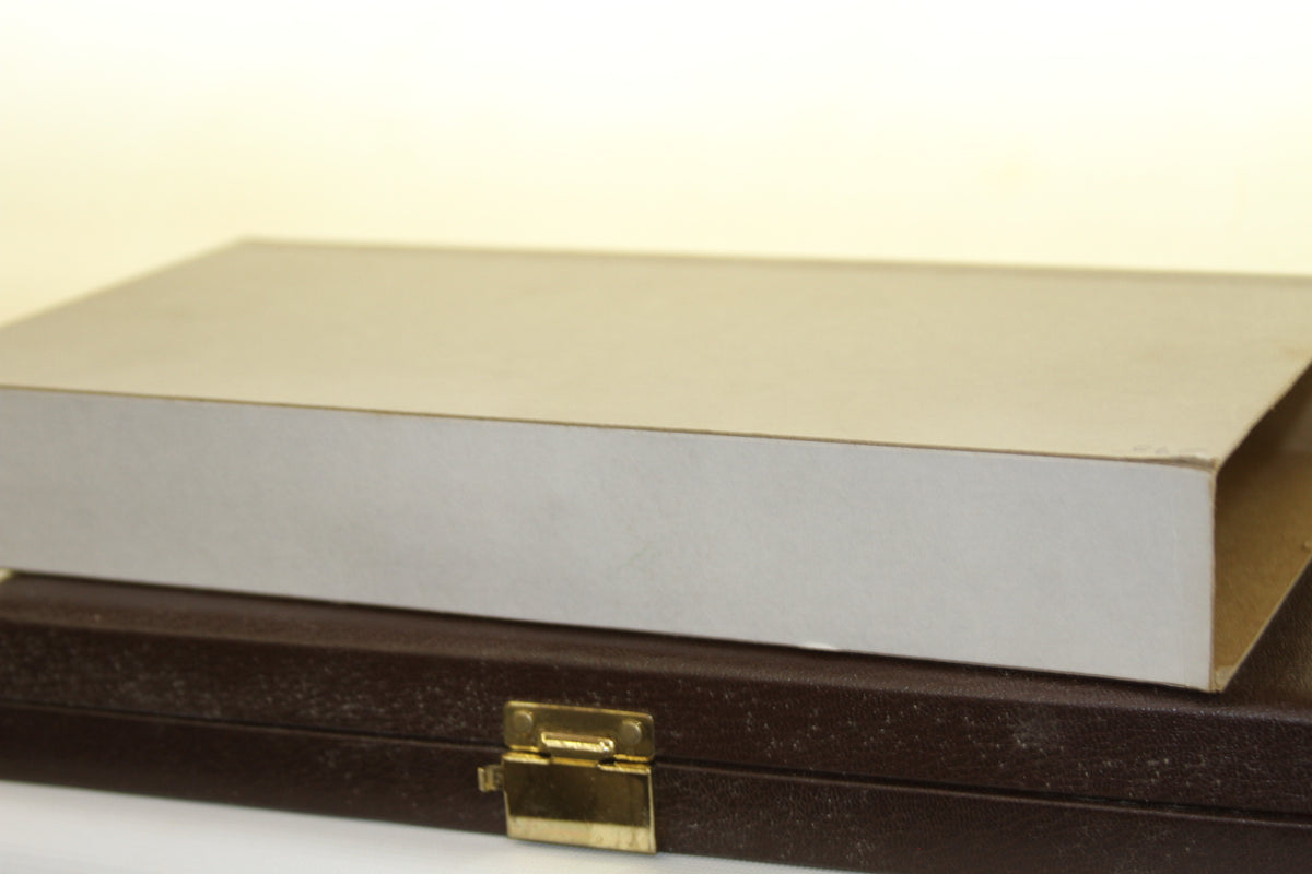 White display sleeve and closed brown Topps 1988 Gallery of Champions case