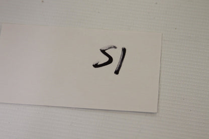 White index card labeled with the number 51