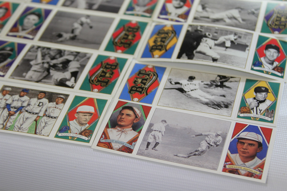 Corner of Upper Deck BAT baseball cards showing logos, action shots and player cards