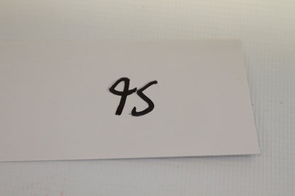 Index card with number 95 written in marker