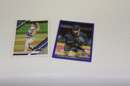 Walker Buehler and Corey Kluber baseball cards side by side