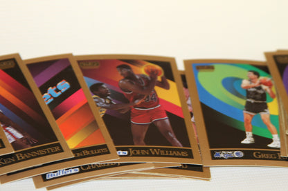 NBA trading cards showing John Williams, Ken Bannister, and others
