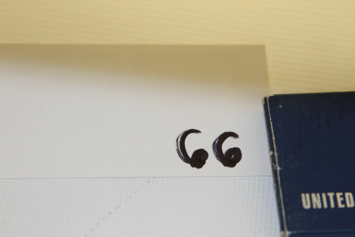 Handwritten '66' label with corner of blue U.S. Special Mint Set case