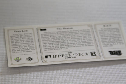Close-up of Upper Deck company copyright and BAT info on back of a baseball card