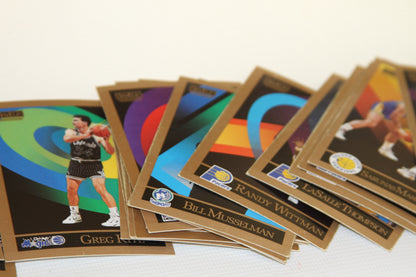 Stack of NBA mini-books/cards showing Greg Kite and additional players