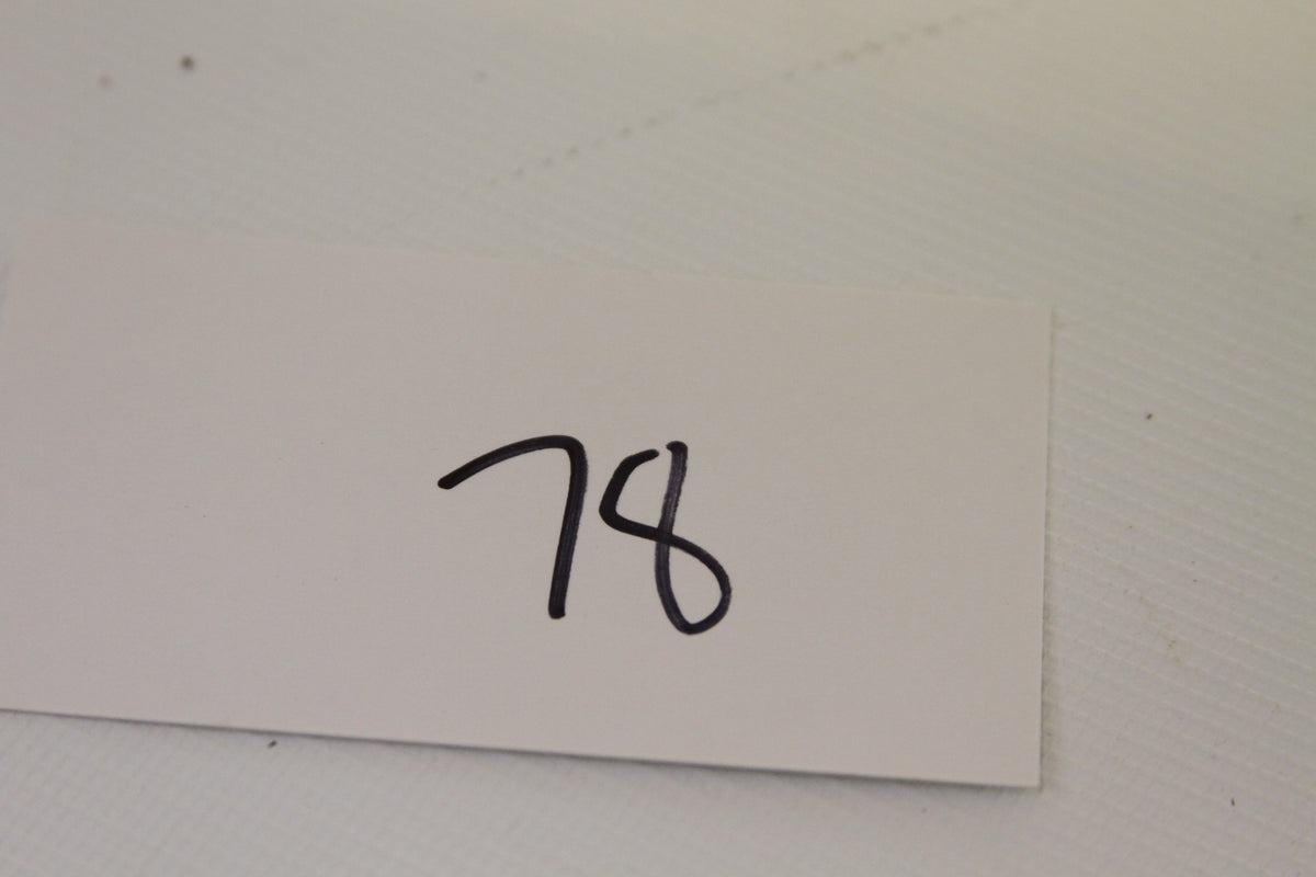 Handwritten '78' marker card from lot inclusion in coin set images