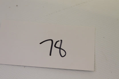 Handwritten '78' marker card from lot inclusion in coin set images